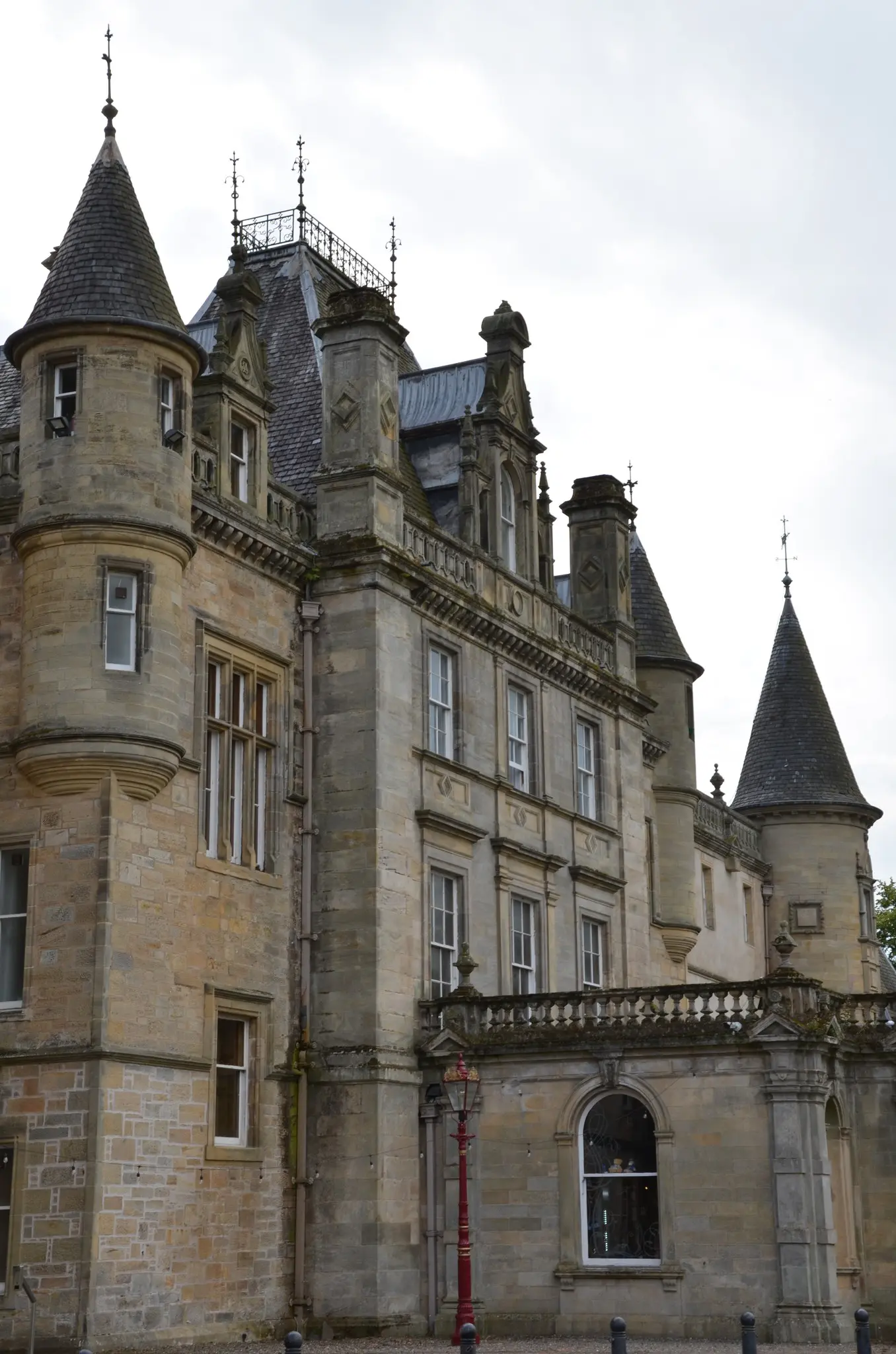 historic Scottish castle with turrets and ornate architecture