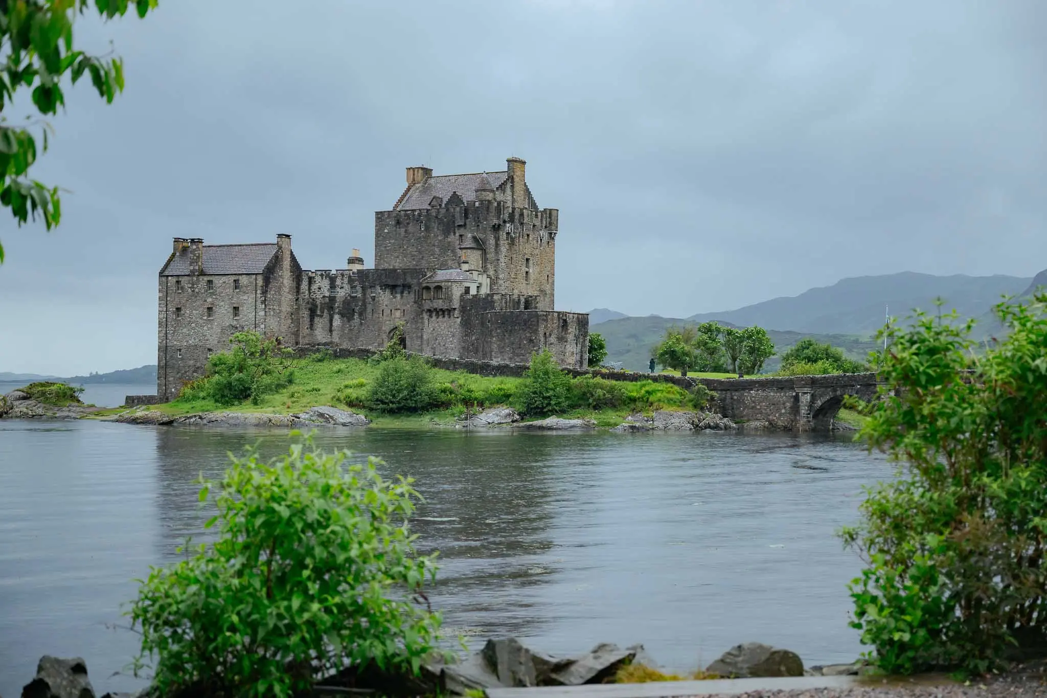 eilean donan castle in scotland on a cloudy day