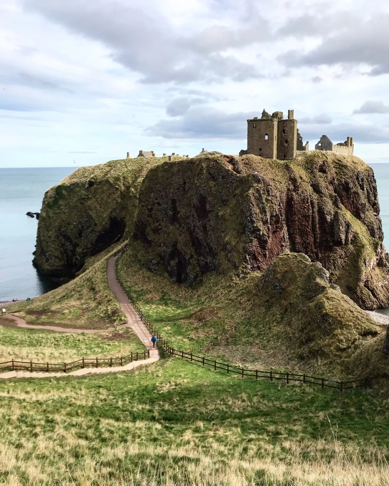 Dunnottar Castle ruins on a cliff overlooking the sea in Scotland