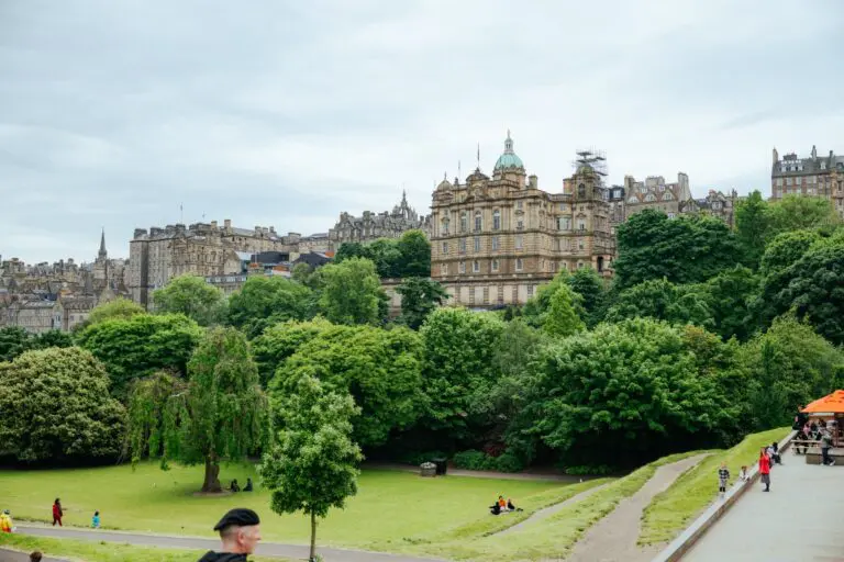 Edinburgh city skyline with historic buildings and lush green park